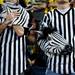Michigan fans hold zebra costume masks in the crowd during a watch party at Crisler Arena on Monday, April 8. Daniel Brenner I AnnArbor.com